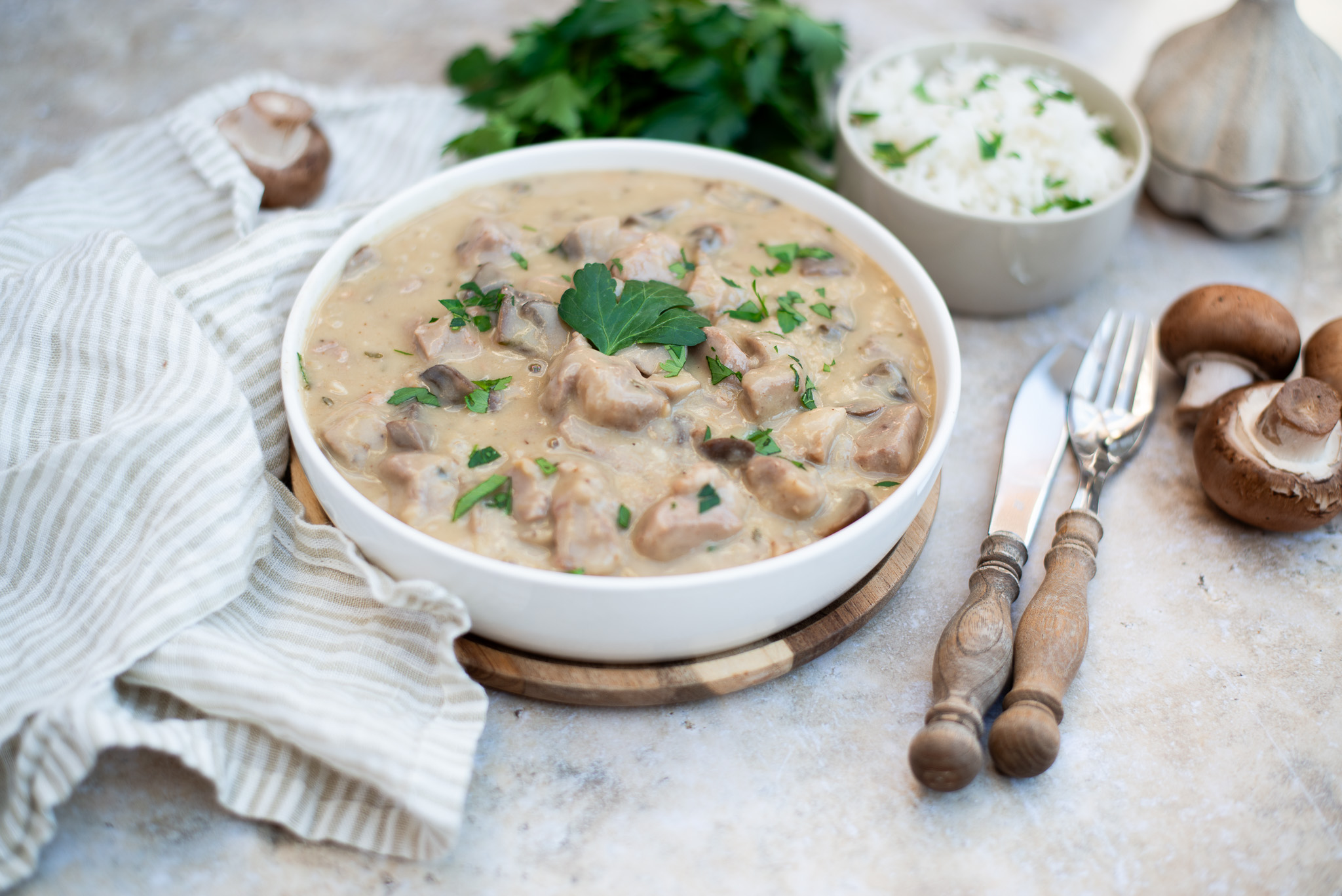 Varkensstoof met champignonsaus